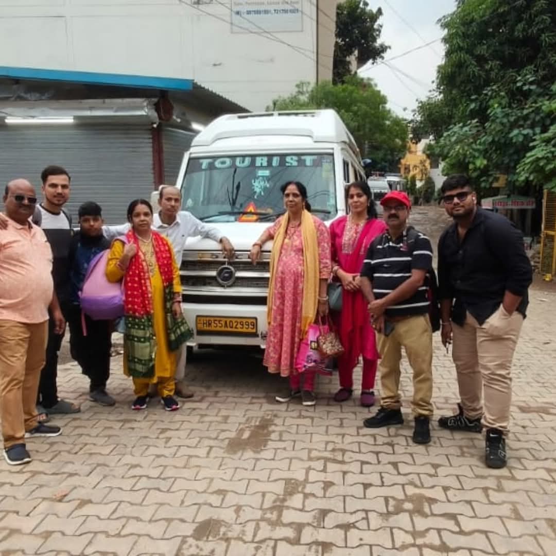 Char Dham Yatri travelers with their tempo traveller before the yatra