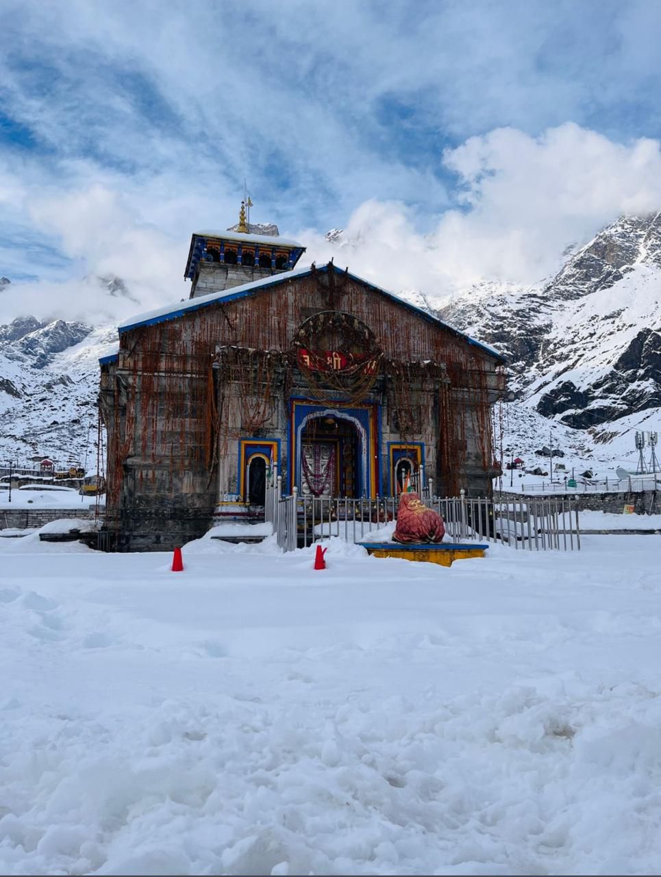 Kedarnath temple in snow, one of the Char Dham destinations we cover